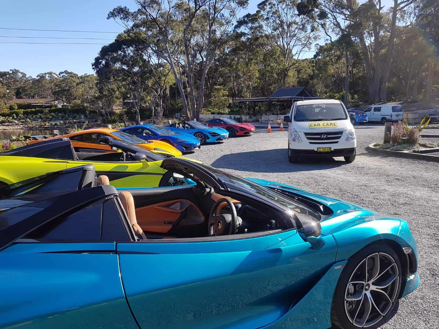 A group of McLaren cars on a drive day